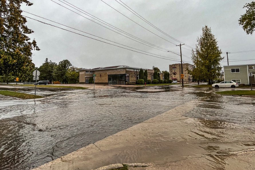 The intersection of Reimer Ave and First St covered in water during the rainfall event in mid-September.